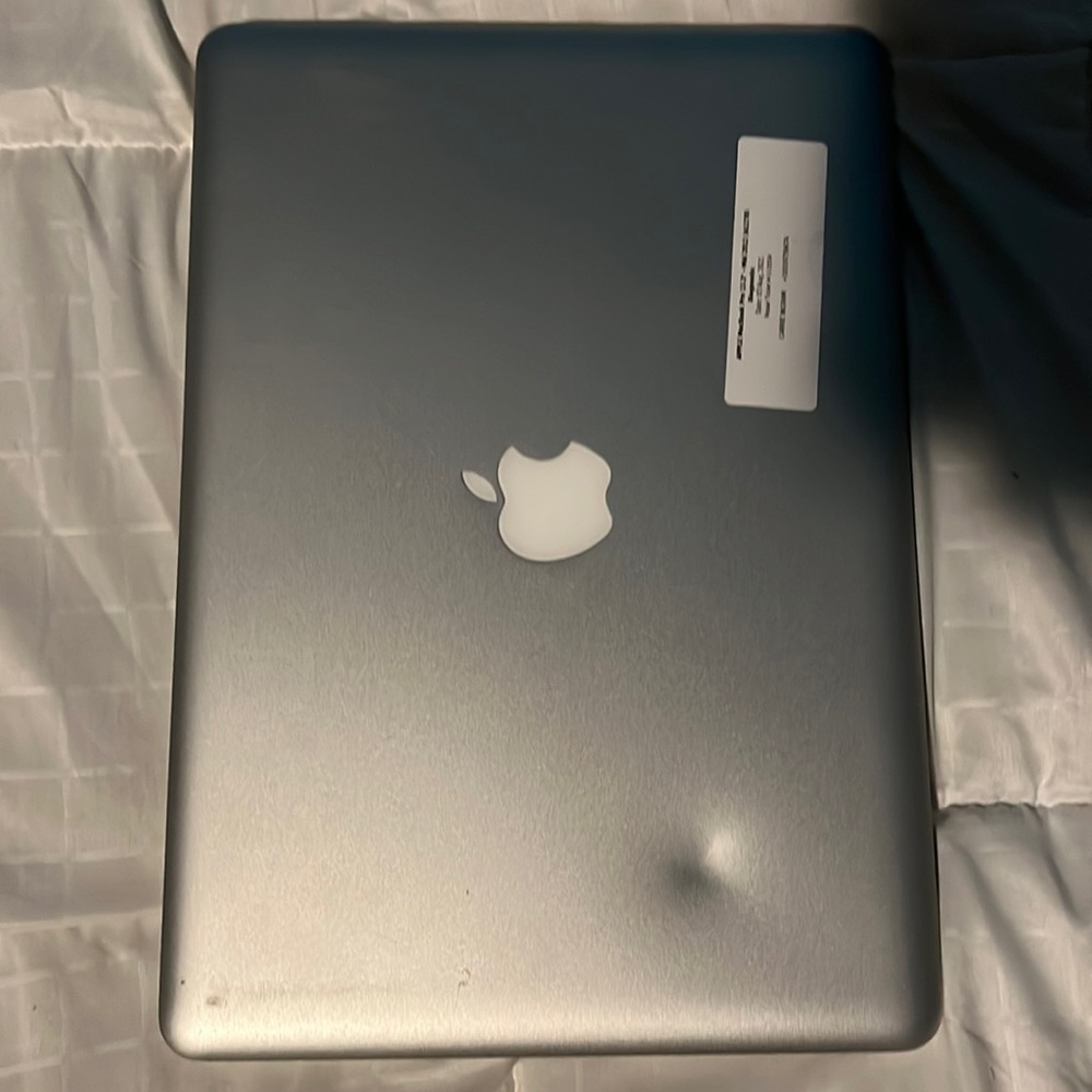 MacBook Pro 2012 good condition except for blown up battery under computer mouse